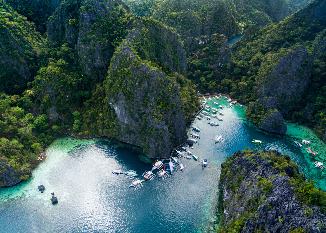 Pier in Coron, Palawan, Philippines. Kayangan Lake in Background. Tour A.