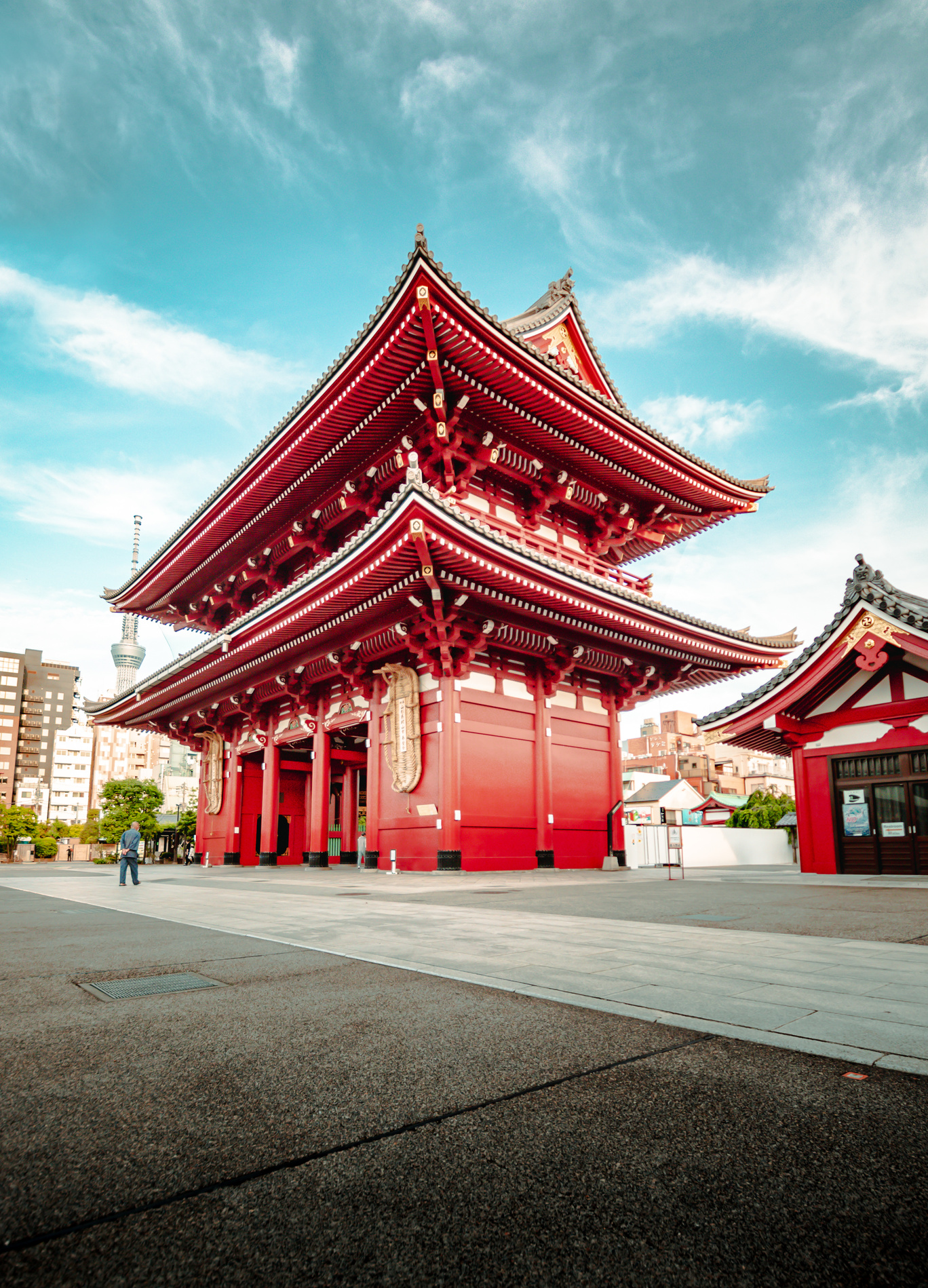 Traditional old Buddhist shrine against blue sky